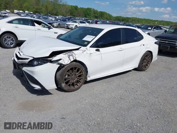2023 Toyota Camry SE with VIN 4T1T11BK9PU079486, listed as a IAAI auction lot 42144138 with 49,598 mi miles and . Bid and sale history available at DreamBid. Image 2.