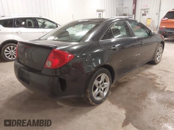 ✅ 2009 Pontiac G6 1SA • VIN: 1G2ZG57B994171248 • Lot: 42335463. Listed on IAAI with 169,611 mi. Free auction sales archive from the USA and detailed vehicle history report at DreamBid. Image 4.
