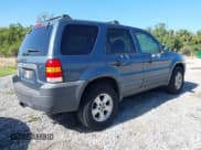 ✅ 2006 Ford Escape XLT • VIN: 1FMYU031X6KB00529 • Lot: 42142206. Listed on IAAI with 125,462 mi. Free auction sales archive from the USA and detailed vehicle history report at DreamBid. Image 4.