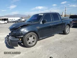 ✅ 2003 Ford F-150 Harley-Davidson • VIN: 1FTRW07333KC91740 • Lot: 45636205. Listed on Copart with 175,945 mi. Free auction sales archive from the USA and detailed vehicle history report at DreamBid. Image 1.