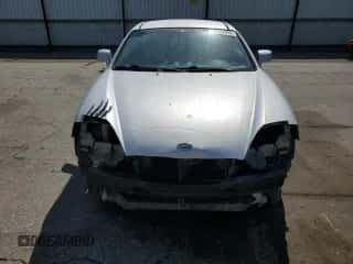 2005 Hyundai Tiburon GT с VIN KMHHN65F05U169144, выставлен на аукционе Copart как лот 67944695 с пробегом 139 483 миль миль и Списание • Salvage title. История ставок и продаж доступна на DreamBid. Изображение 5.