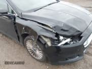 ✅ 2016 Ford Fusion Titanium • VIN: 3FA6P0K91GR261347 • Lot: 43737815. Listed on IAAI with 205,791 mi. Free auction sales archive from the USA and detailed vehicle history report at DreamBid. Image 6.