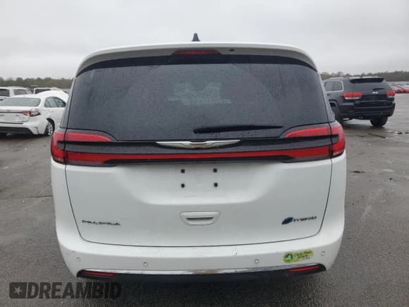 ✅ 2023 Chrysler Pacifica Hybrid Touring L • VIN: 2C4RC1L76PR523309 • Лот: 91471165. Опубликован ранее на Copart с пробегом 20 086 миль. Бесплатный доступ к архиву аукционных продаж из США и подробный отчёт об истории автомобиля на DreamBid. Изображение 6.