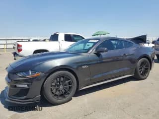 ✅ 2022 Ford Mustang GT Premium • VIN: 1FA6P8CF6N5133091 • Lot: 64253075. Listed on Copart with 28,214 mi. Free auction sales archive from the USA and detailed vehicle history report at DreamBid. Image 1.