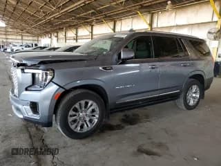 ✅ 2022 GMC Yukon Denali • VIN: 1GKS2DKLXNR243646 • Лот: 66858815. Опубликован ранее на Copart с пробегом 21 815 миль. Бесплатный доступ к архиву аукционных продаж из США и подробный отчёт об истории автомобиля на DreamBid. Изображение 1.