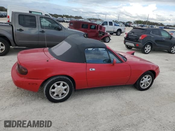 ✅ 1990 Mazda MX-5 Miata Special Edition • VIN: JM1NA3511L0136910 • Lot: 79403984. Listed on Copart with 62,567 mi. Free auction sales archive from the USA and detailed vehicle history report at DreamBid. Image 3.