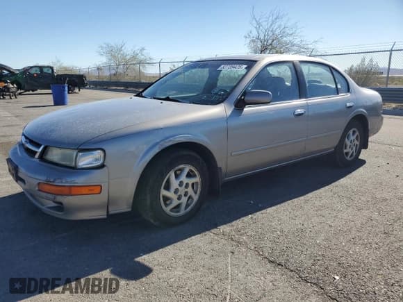 ✅ 1998 Nissan Maxima GXE • VIN: JN1CA21A6WT303680 • Лот: 82739425. Опубликован ранее на Copart с пробегом 121 593 миль. Бесплатный доступ к архиву аукционных продаж из США и подробный отчёт об истории автомобиля на DreamBid. Изображение 1.