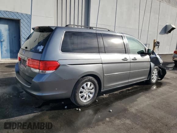 ✅ 2009 Honda Odyssey EX • VIN: 5FNRL38449B020760 • Лот: 91812515. Опубликован ранее на Copart с пробегом 182 030 миль. Бесплатный доступ к архиву аукционных продаж из США и подробный отчёт об истории автомобиля на DreamBid. Изображение 3.