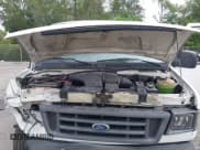 ✅ 2005 Ford Econoline Cargo • VIN: 1FTRE14W75HA41442 • Lot: 42438411. Listed on IAAI with 197,241 mi. Free auction sales archive from the USA and detailed vehicle history report at DreamBid. Image 10.