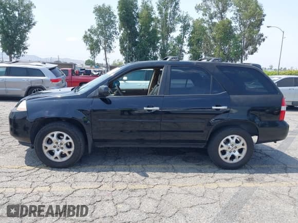 ✅ 2002 Acura MDX Touring • VIN: 2HNYD18812H532762 • Лот: 42419077. Опубликован ранее на IAAI с пробегом 230 004 миль. Бесплатный доступ к архиву аукционных продаж из США и подробный отчёт об истории автомобиля на DreamBid. Изображение 14.