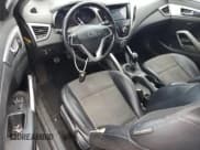 ✅ 2013 Hyundai Veloster w/Black Int • VIN: KMHTC6AD4DU163477 • Lot: 74700604. Wystawiony na Copart z przebiegiem 109 184 mil. Bezpłatny archiwum sprzedaży aukcyjnych z USA i szczegółowy raport historii pojazdu na DreamBid. Zdjęcie 8.