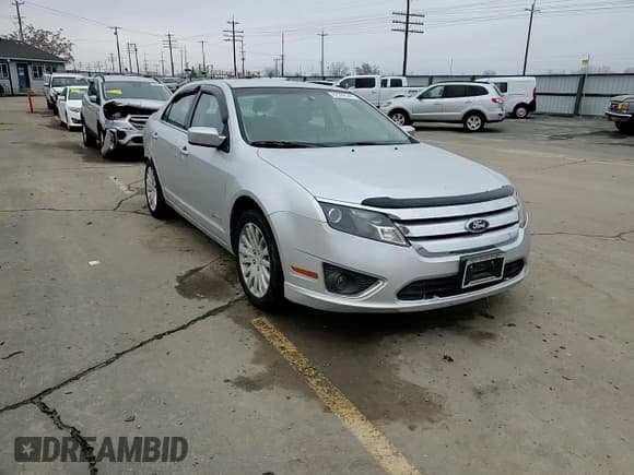 ✅ 2011 Ford Fusion Hybrid • VIN: 3FADP0L37BR135584 • Lot: 82399544. Listed on Copart with 108,575 mi. Free auction sales archive from the USA and detailed vehicle history report at DreamBid. Image 11.