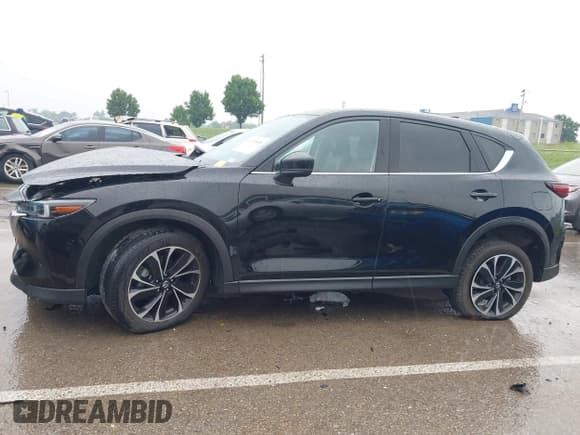 ✅ 2022 Mazda CX-5 S Premium • VIN: JM3KFBDM1N1572865 • Лот: 42379800. Опубликован ранее на IAAI с пробегом 26 667 миль. Бесплатный доступ к архиву аукционных продаж из США и подробный отчёт об истории автомобиля на DreamBid. Изображение 15.