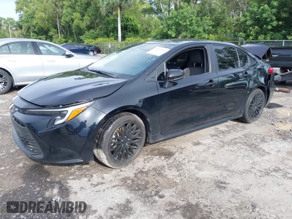 ✅ 2024 Toyota Corolla Hybrid LE • VIN: JTDBCMFE0R3052072 • Lot: 43231812. Listed on IAAI with 35,949 mi. Free auction sales archive from the USA and detailed vehicle history report at DreamBid. Image 2.
