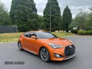 ✅ 2016 Hyundai Veloster Turbo • VIN: KMHTC6AEXGU274614 • Lot: 61510255. Wystawiony na Copart z przebiegiem 74 071 mil. Bezpłatny archiwum sprzedaży aukcyjnych z USA i szczegółowy raport historii pojazdu na DreamBid. Zdjęcie 1.