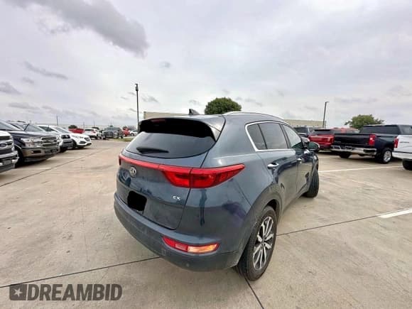 ✅ 2017 Kia Sportage EX • VIN: KNDPNCAC1H7115753 • Lot: 91518805. Wystawiony na Copart z przebiegiem 153 500 mil. Bezpłatny archiwum sprzedaży aukcyjnych z USA i szczegółowy raport historii pojazdu na DreamBid. Zdjęcie 4.