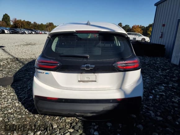 ✅ 2023 Chevrolet Bolt EV 2LT • VIN: 1G1FX6S05P4142541 • Lot: 77150344. Wystawiony na Copart z przebiegiem 48 409 mil. Bezpłatny archiwum sprzedaży aukcyjnych z USA i szczegółowy raport historii pojazdu na DreamBid. Zdjęcie 6.