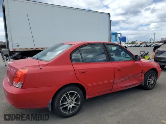 ✅ 2004 Hyundai Elantra GLS • VIN: KMHDN46D14U858205 • Lot: 71749395. Listed on Copart with 133,056 mi. Free auction sales archive from the USA and detailed vehicle history report at DreamBid. Image 3.