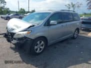 ✅ 2016 Toyota Sienna LE AAS • VIN: 5TDKK3DC4GS746001 • Lot: 43076702. Listed on IAAI with 97,690 mi. Free auction sales archive from the USA and detailed vehicle history report at DreamBid. Image 16.