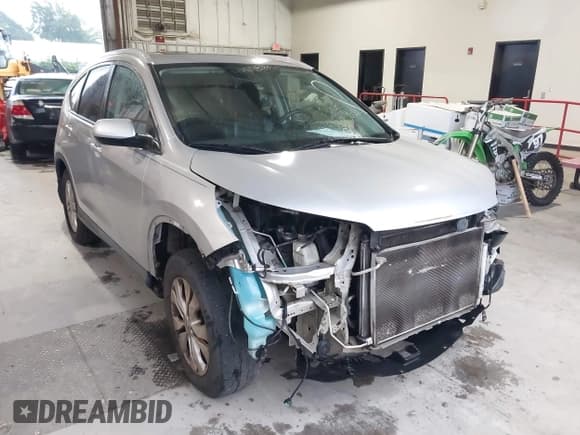 ✅ 2012 Honda CR-V EX-L • VIN: 5J6RM4H70CL026132 • Lot: 42435154. Listed on IAAI with 202,545 mi. Free auction sales archive from the USA and detailed vehicle history report at DreamBid. Image 1.