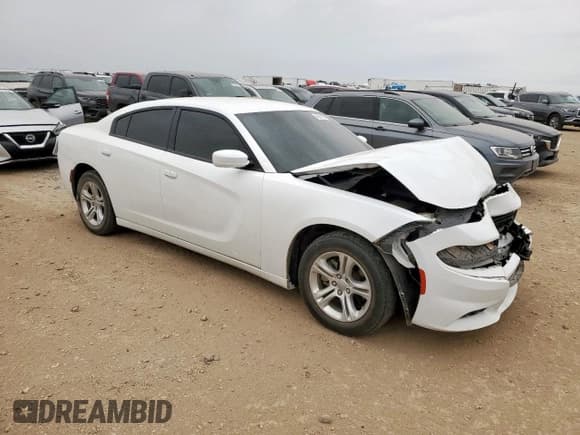 ✅ 2022 Dodge Charger SXT • VIN: 2C3CDXBG0NH152338 • Lot: 84049725. Listed on Copart with 57,291 mi. Free auction sales archive from the USA and detailed vehicle history report at DreamBid. Image 4.