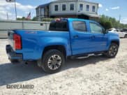 ✅ 2021 Chevrolet Colorado 4WD Z71 • VIN: 1GCGTDEN3M1215633 • Лот: 62021584. Опубликован ранее на Copart с пробегом 45 194 миль. Бесплатный доступ к архиву аукционных продаж из США и подробный отчёт об истории автомобиля на DreamBid. Изображение 3.