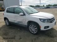 ✅ 2013 Volkswagen Tiguan SE • VIN: WVGBV7AX7DW512304 • Lot: 55928365. Listed on Copart with 142,520 mi. Free auction sales archive from the USA and detailed vehicle history report at DreamBid. Image 14.