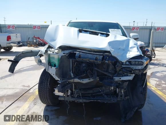 ✅ 2023 Toyota Tacoma SR • VIN: 3TYRZ5CN5PT034397 • Lot: 42055222. Listed on IAAI with 39,144 mi. Free auction sales archive from the USA and detailed vehicle history report at DreamBid. Image 13.