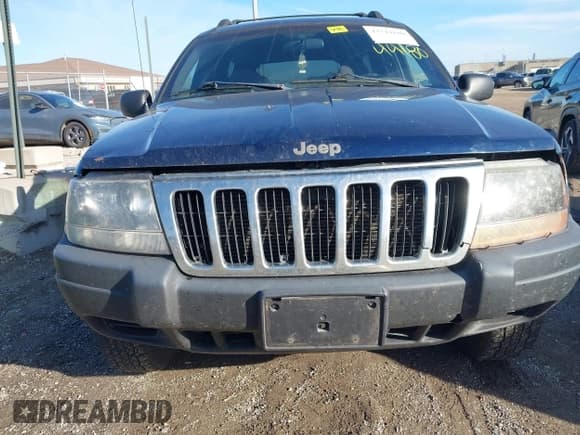 ✅ 2001 Jeep Grand Cherokee Laredo • VIN: 1J4GW48S01C699585 • Lot: 43744180. Listed on IAAI with 219,402 mi. Free auction sales archive from the USA and detailed vehicle history report at DreamBid. Image 12.
