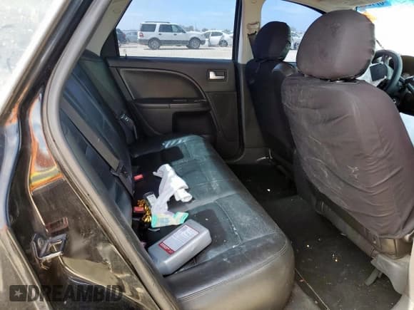 ✅ 2006 Ford Five Hundred Limited • VIN: 1FAFP25116G125033 • Lot: 67128375. Wystawiony na Copart z przebiegiem Nie podano. Bezpłatny archiwum sprzedaży aukcyjnych z USA i szczegółowy raport historii pojazdu na DreamBid. Zdjęcie 10.