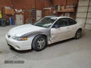 ✅ 2002 Pontiac Grand Prix GT • VIN: 1G2WP12K52F262028 • Лот: 70868895. Опубликован ранее на Copart с пробегом 323 648 миль. Бесплатный доступ к архиву аукционных продаж из США и подробный отчёт об истории автомобиля на DreamBid. Изображение 1.