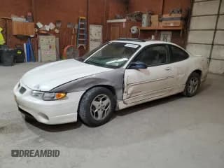 ✅ 2002 Pontiac Grand Prix GT • VIN: 1G2WP12K52F262028 • Lot: 70868895. Listed on Copart with 323,648 mi. Free auction sales archive from the USA and detailed vehicle history report at DreamBid. Image 1.