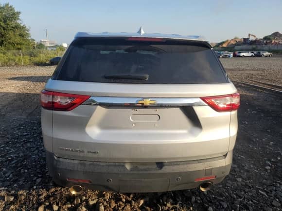 2018 Chevrolet Traverse LS with VIN 1GNEVFKW6JJ199862, listed as a Copart auction lot 69984765 with 74,949 mi miles and Salvage title. Bid and sale history available at DreamBid. Image 6.