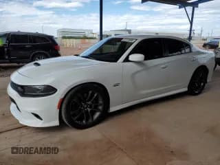✅ 2022 Dodge Charger Scat Pack Widebody • VIN: 2C3CDXGJ4NH257243 • Lot: 87373095. Listed on Copart with 69,564 mi. Free auction sales archive from the USA and detailed vehicle history report at DreamBid. Image 1.