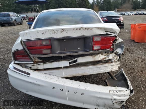 ✅ 1998 Buick Park Avenue Ultra • VIN: 1G4CU5214W4626989 • Лот: 93940945. Опубликован ранее на Copart с пробегом Не указан. Бесплатный доступ к архиву аукционных продаж из США и подробный отчёт об истории автомобиля на DreamBid. Изображение 6.