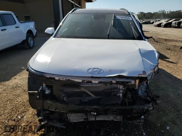 2024 Hyundai Kona Limited with VIN KM8HE3A30RU161268, listed as a Copart auction lot 77844404 with 1,598 mi miles and Salvage title. Bid and sale history available at DreamBid. Image 5.