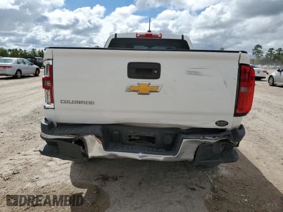 ✅ 2015 Chevrolet Colorado 2WD WT • VIN: 1GCHSAEA6F1154073 • Лот: 71229874. Опубликован ранее на Copart с пробегом 71 322 миль. Бесплатный доступ к архиву аукционных продаж из США и подробный отчёт об истории автомобиля на DreamBid. Изображение 6.