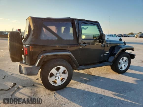 ✅ 2008 Jeep Wrangler Sahara • VIN: 1J8FA54158L589606 • Лот: 82117285. Опубликован ранее на Copart с пробегом 143 741 миль. Бесплатный доступ к архиву аукционных продаж из США и подробный отчёт об истории автомобиля на DreamBid. Изображение 3.