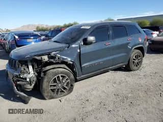 2017 Jeep Grand Cherokee Trailhawk with VIN 1C4RJFLT1HC801964, listed as a Copart auction lot 81620235 with 116,245 mi miles and Salvage title. Bid and sale history available at DreamBid. Image 1.