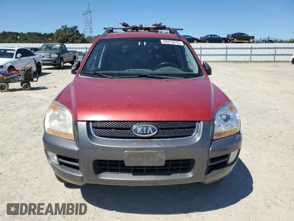 ✅ 2007 Kia Sportage EX • VIN: KNDJE723X77423255 • Лот: 69279715. Опубликован ранее на Copart с пробегом 126 848 миль. Бесплатный доступ к архиву аукционных продаж из США и подробный отчёт об истории автомобиля на DreamBid. Изображение 5.