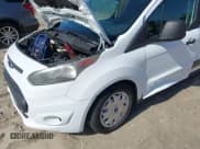 ✅ 2014 Ford Transit Connect XLT • VIN: NM0LS7F72E1171576 • Lot: 42488976. Listed on IAAI with 157,392 mi. Free auction sales archive from the USA and detailed vehicle history report at DreamBid. Image 17.