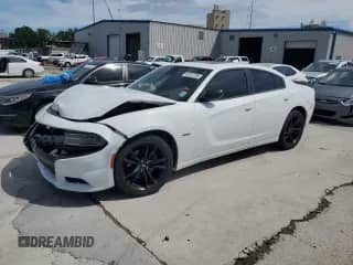 2018 Dodge Charger R/T with VIN 2C3CDXCT5JH169657, listed as a Copart auction lot 61972705 with 119,361 mi miles and Salvage title. Bid and sale history available at DreamBid. Image 1.