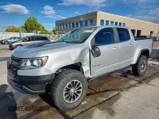 ✅ 2018 Chevrolet Colorado 4WD ZR2 • VIN: 1GCGTEEN3J1260590 • Лот: 86281805. Опубликован ранее на Copart с пробегом 57 572 миль. Бесплатный доступ к архиву аукционных продаж из США и подробный отчёт об истории автомобиля на DreamBid. Изображение 1.
