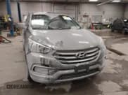 ✅ 2017 Hyundai Santa Fe 2.4L • VIN: 5NMZTDLB9HH000738 • Lot: 43829716. Listed on IAAI with 154,400 mi. Free auction sales archive from the USA and detailed vehicle history report at DreamBid. Image 12.