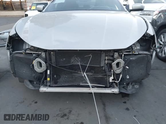 ✅ 2014 Maserati Ghibli • VIN: ZAM57XSA0E1105117 • Lot: 43917494. Listed on IAAI with 41,304 mi. Free auction sales archive from the USA and detailed vehicle history report at DreamBid. Image 6.