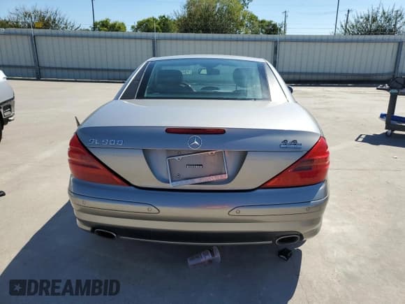 ✅ 2005 Mercedes-Benz SL 500 • VIN: WDBSK75F45F098073 • Лот: 73401994. Опубликован ранее на Copart с пробегом 83 860 миль. Бесплатный доступ к архиву аукционных продаж из США и подробный отчёт об истории автомобиля на DreamBid. Изображение 6.