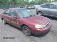 ✅ 1999 Ford Contour SE • VIN: 1FAFP6634XK138445 • Lot: 42835260. Listed on IAAI with 126,100 mi. Free auction sales archive from the USA and detailed vehicle history report at DreamBid. Image 1.