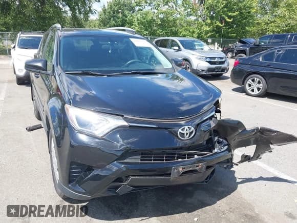✅ 2016 Toyota RAV4 LE • VIN: 2T3BFREV8GW461999 • Lot: 43083231. Listed on IAAI with 139,683 mi. Free auction sales archive from the USA and detailed vehicle history report at DreamBid. Image 18.