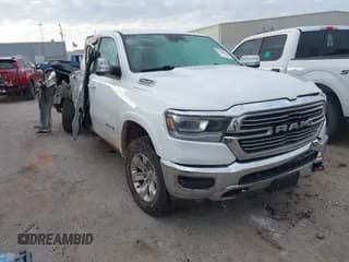 ✅ 2021 Ram 1500 Laramie • VIN: 1C6SRFJMXMN705990 • Lot: 41155618. Listed on IAAI with 89,518 mi. Free auction sales archive from the USA and detailed vehicle history report at DreamBid. Image 1.