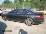 ✅ 2012 Audi A8 • VIN: WAURVAFD9CN012709 • Lot: 56423795. Listed on Copart with 191,566 mi. Free auction sales archive from the USA and detailed vehicle history report at DreamBid. Image 2.